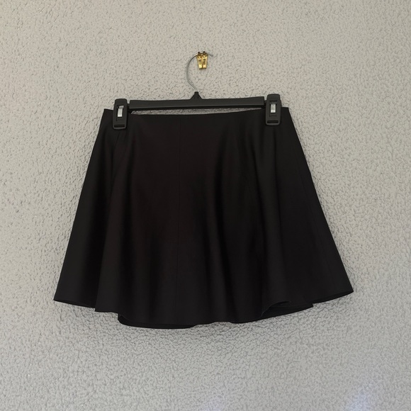 ALO Yoga Airlight Down The Line Black Mini Tennis Skirt with shorts underneath - Picture 7 of 11
